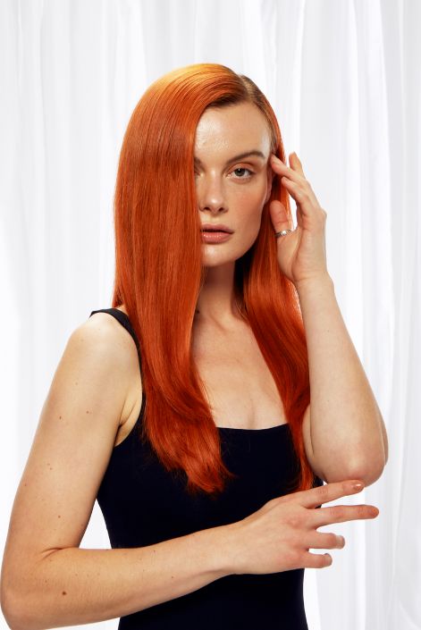 model after adding flaming ginger hair extensions