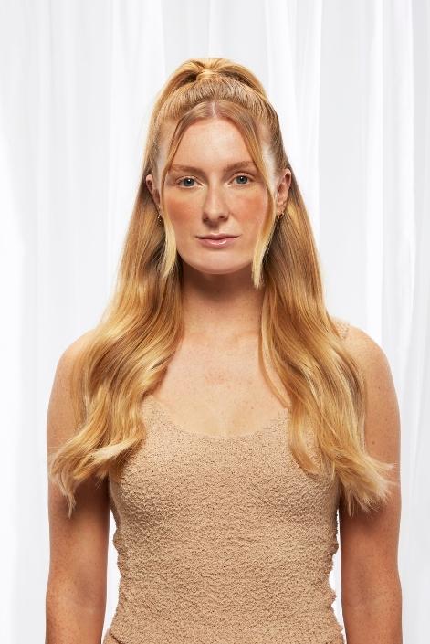 model using strawberry blonde hair extension