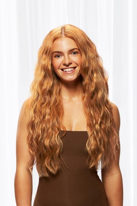 model using cinnamon swirl hair extension